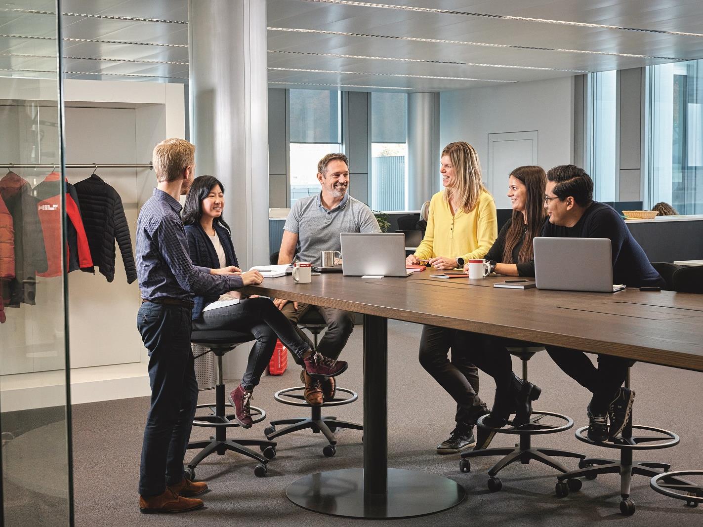 Diverse Group Discussing at a Table