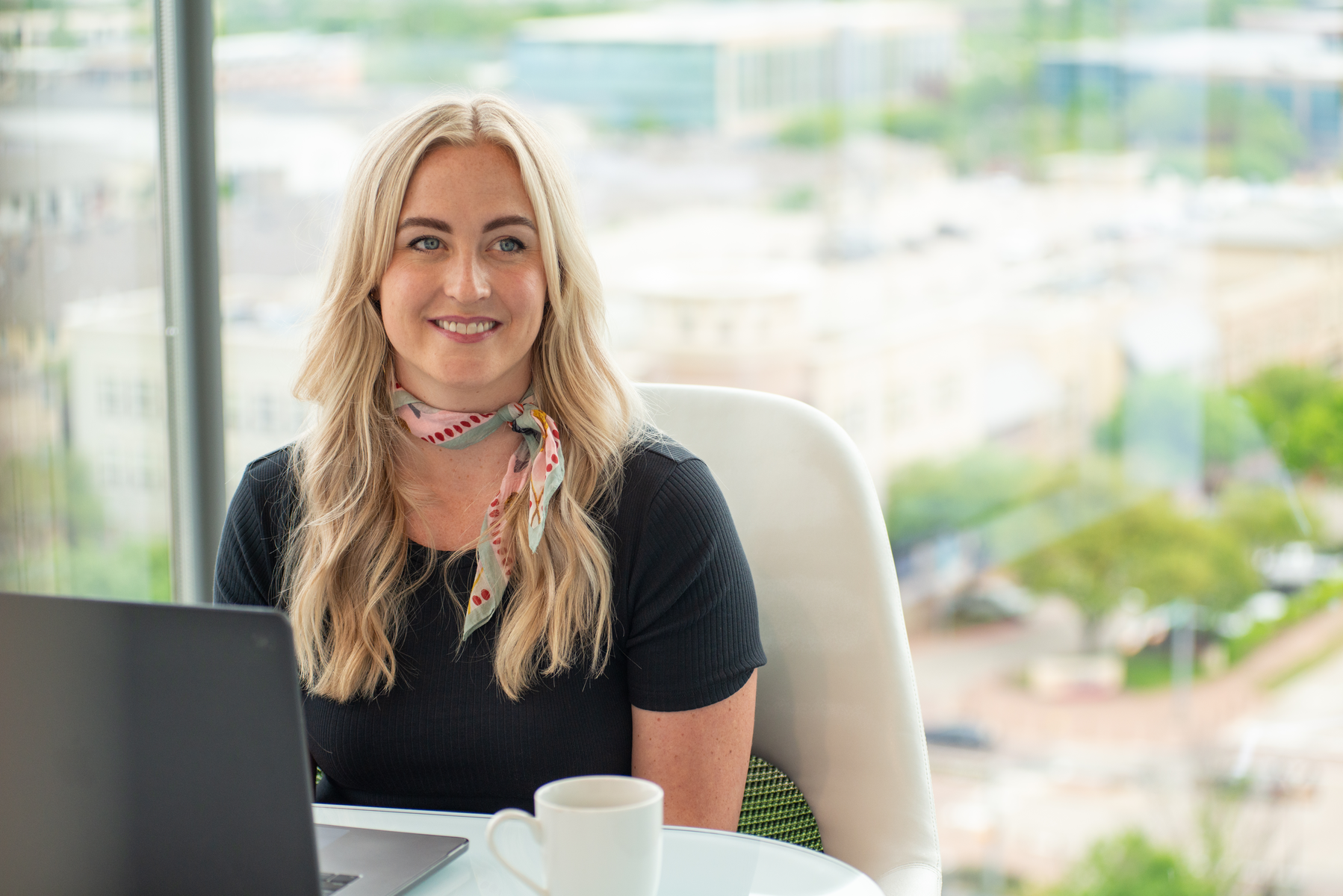 Plano Female Employee Blonde Smiling