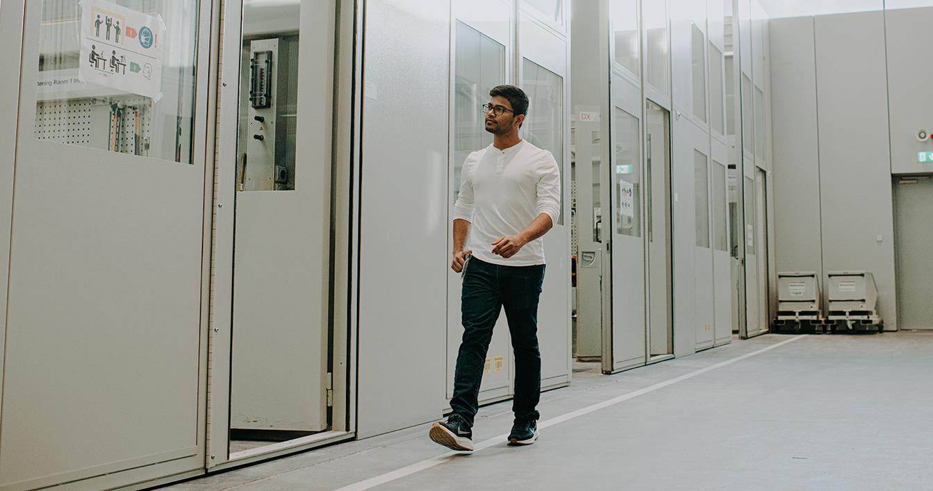 Male Walking Down Hallway of Innovation Center