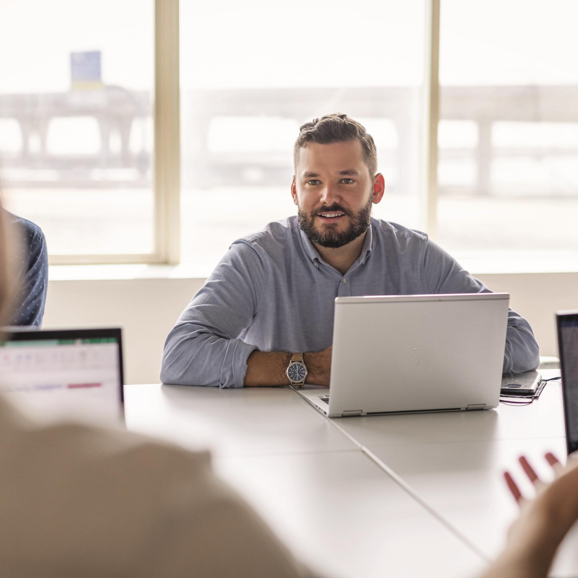 Team Member and Leader Discussing Development