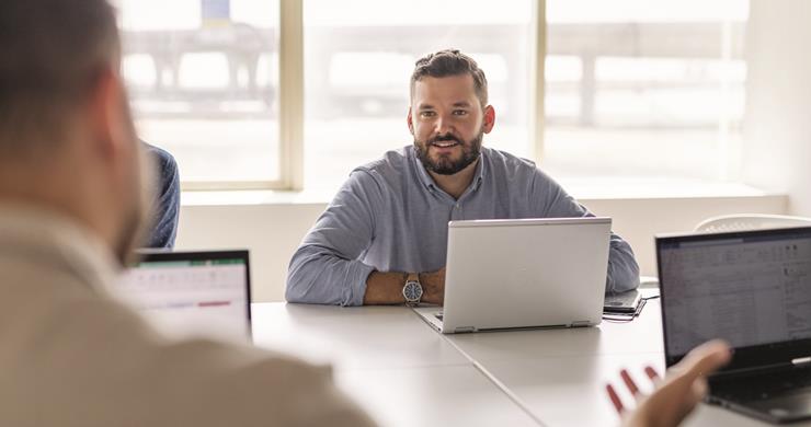 Team Member and Leader Discussing Development