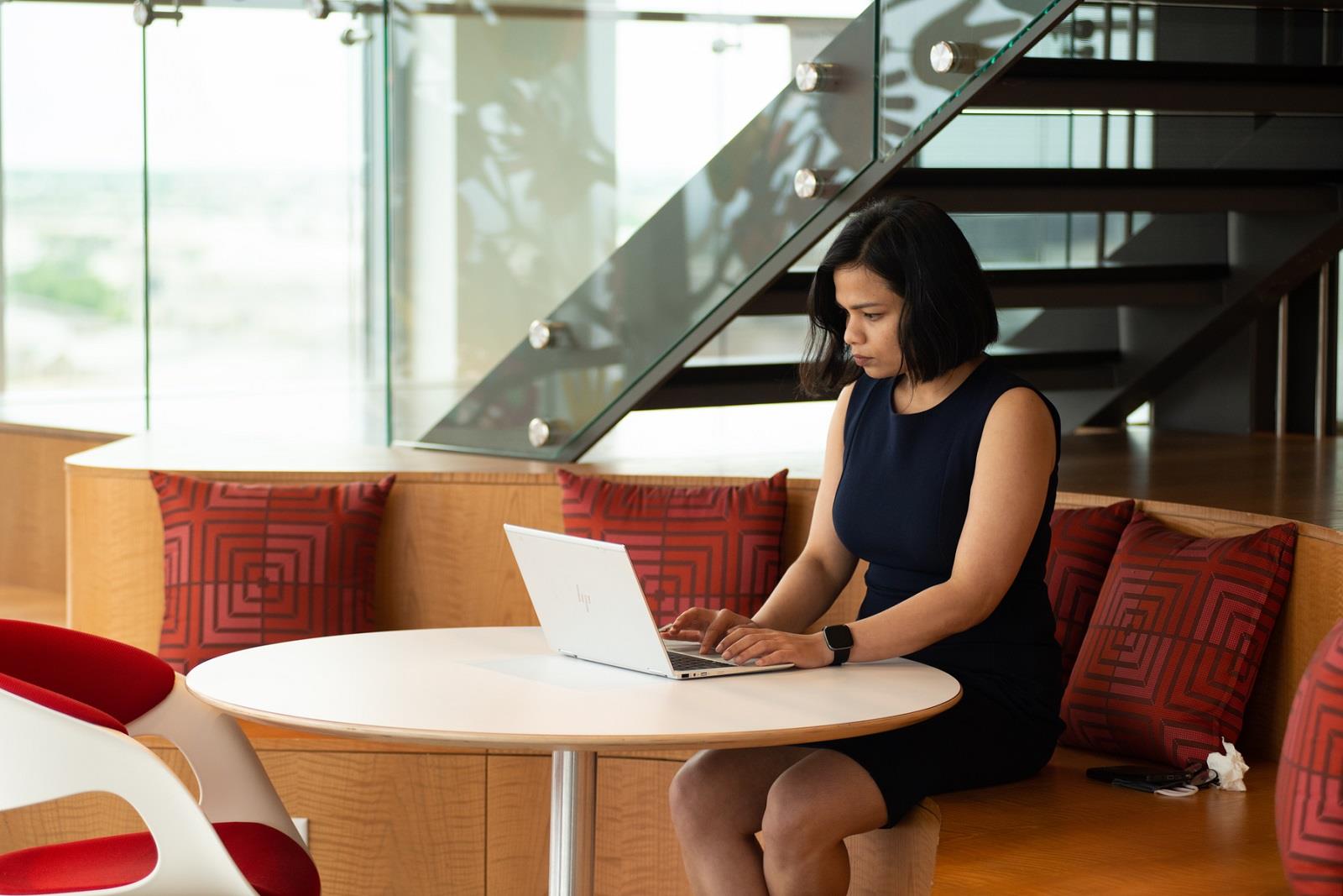 Plano Female Employee Working Laptop 5