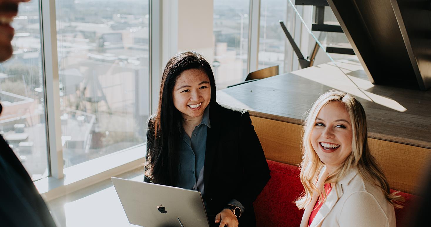 Two Females in Meeting in Cafe